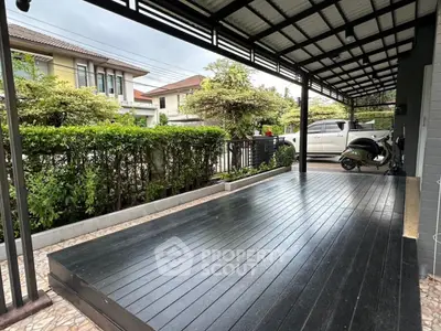 Spacious covered patio with modern design in suburban home