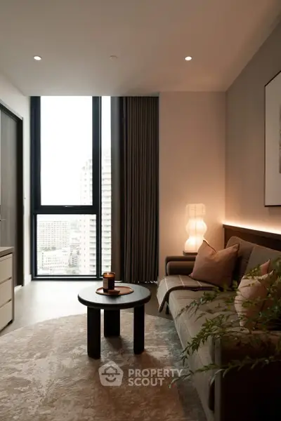 Modern living room with large window and stylish decor in urban apartment