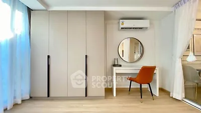 Stylish bedroom with modern wardrobe and elegant vanity setup