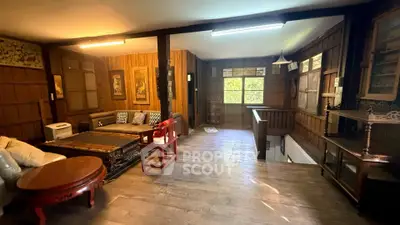 Charming rustic living room with wooden decor and cozy seating area