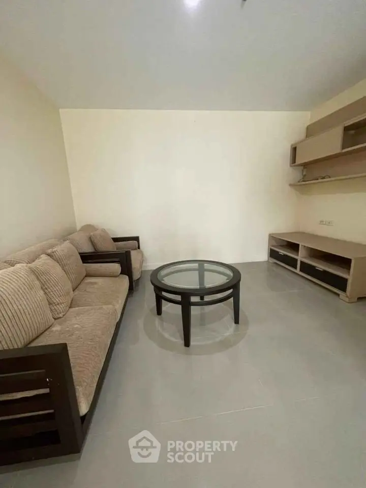 Spacious living room with modern furniture and elegant decor