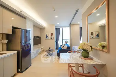Modern open-plan living room with stylish decor and natural light