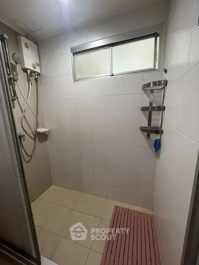 Modern bathroom with shower and sleek tile design