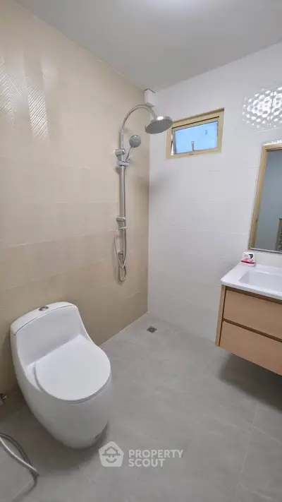 Modern bathroom with sleek fixtures and neutral tones