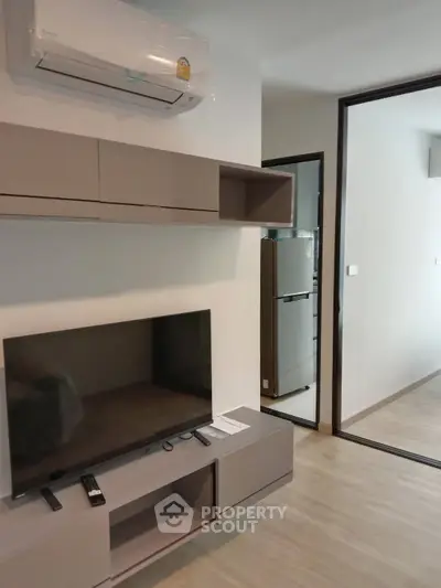 Modern kitchen with sleek cabinetry and open layout design