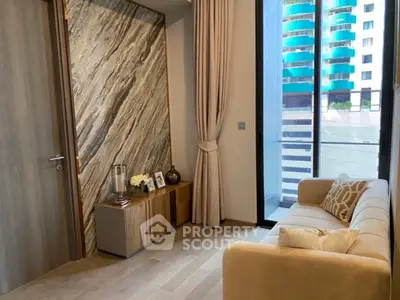Stylish modern living room with elegant decor and large window view