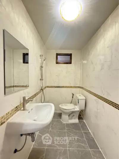 Modern bathroom with sleek fixtures and elegant tile design
