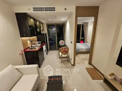 Modern apartment interior with open kitchen and cozy living area