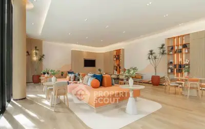 Spacious modern living room with stylish decor and ample natural light