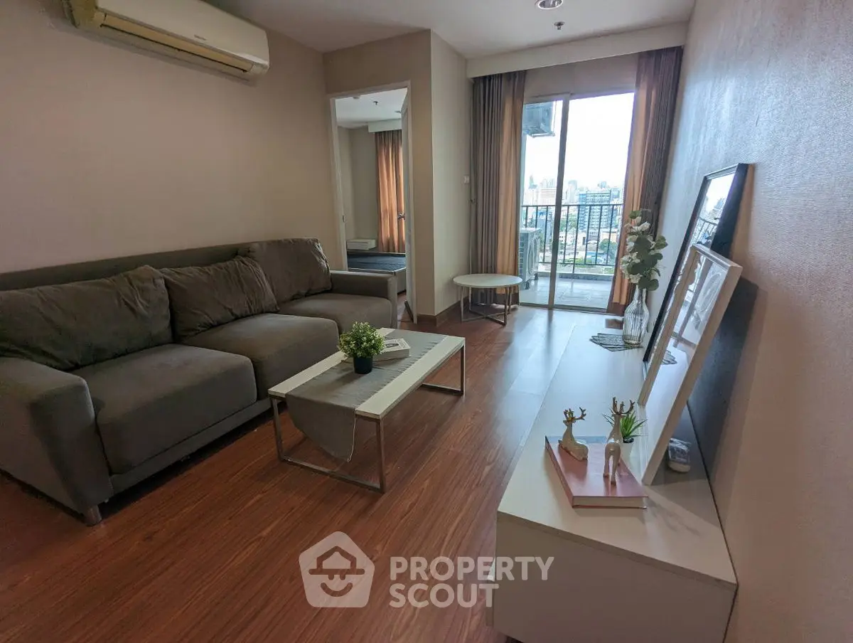 Modern living room with balcony view and stylish decor