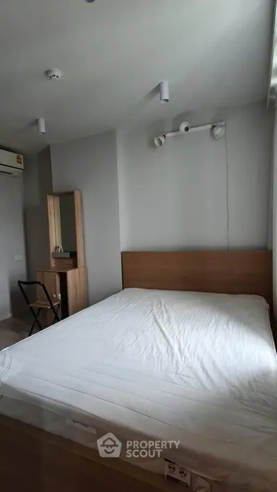 Modern bedroom with minimalist design and natural light