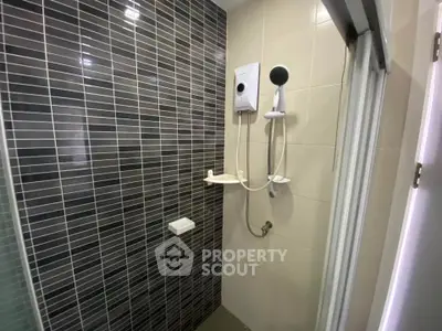 Modern bathroom with sleek shower and stylish tile design