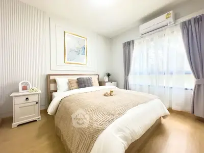 Cozy and bright bedroom with modern decor and natural light