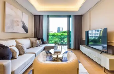 Luxurious living room with modern decor and stunning balcony view