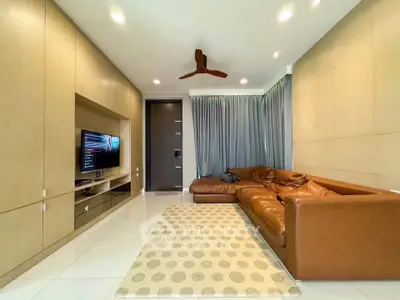 Spacious modern living room with sleek design and cozy leather sofa