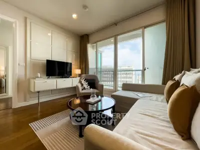 Spacious modern living room with large windows and elegant decor