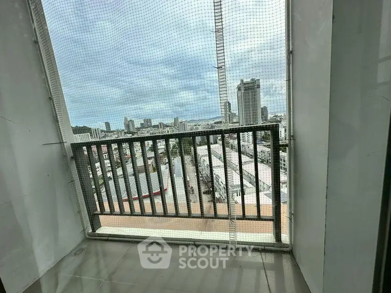 Stunning cityscape view from a high-rise balcony, perfect for urban living enthusiasts.
