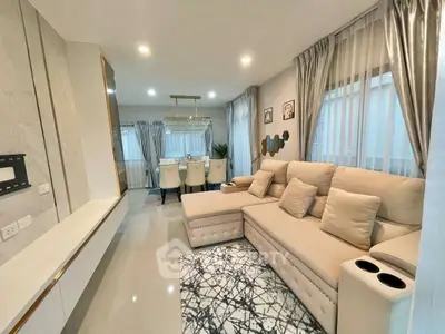 Modern living room with elegant decor and spacious seating area
