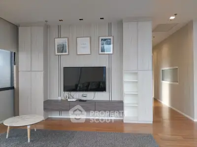 Modern living room with sleek TV setup and stylish decor