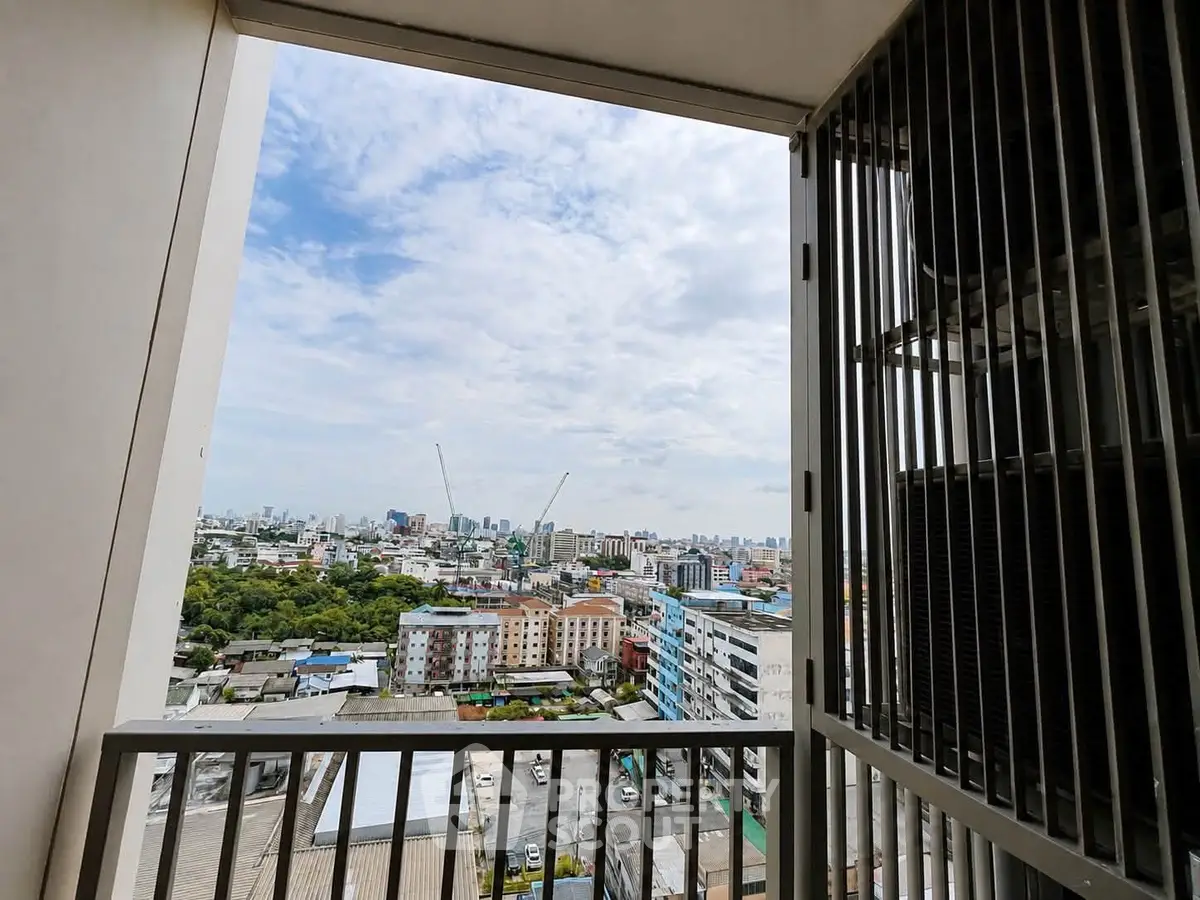 Stunning cityscape view from a high-rise balcony, perfect for urban living enthusiasts.