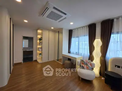 Spacious modern living room with stylish decor and natural light