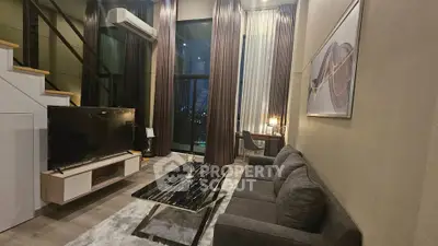 Luxurious modern living room with high ceilings and city view, featuring elegant decor and stylish furniture.