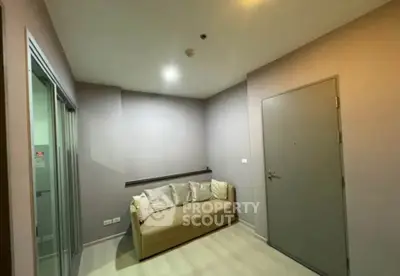 Cozy small living room with modern sofa and neutral tones