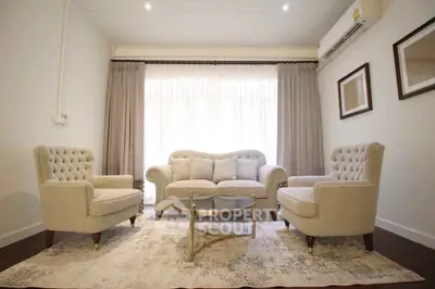 Elegant living room with plush seating and modern decor, perfect for relaxation and entertaining.
