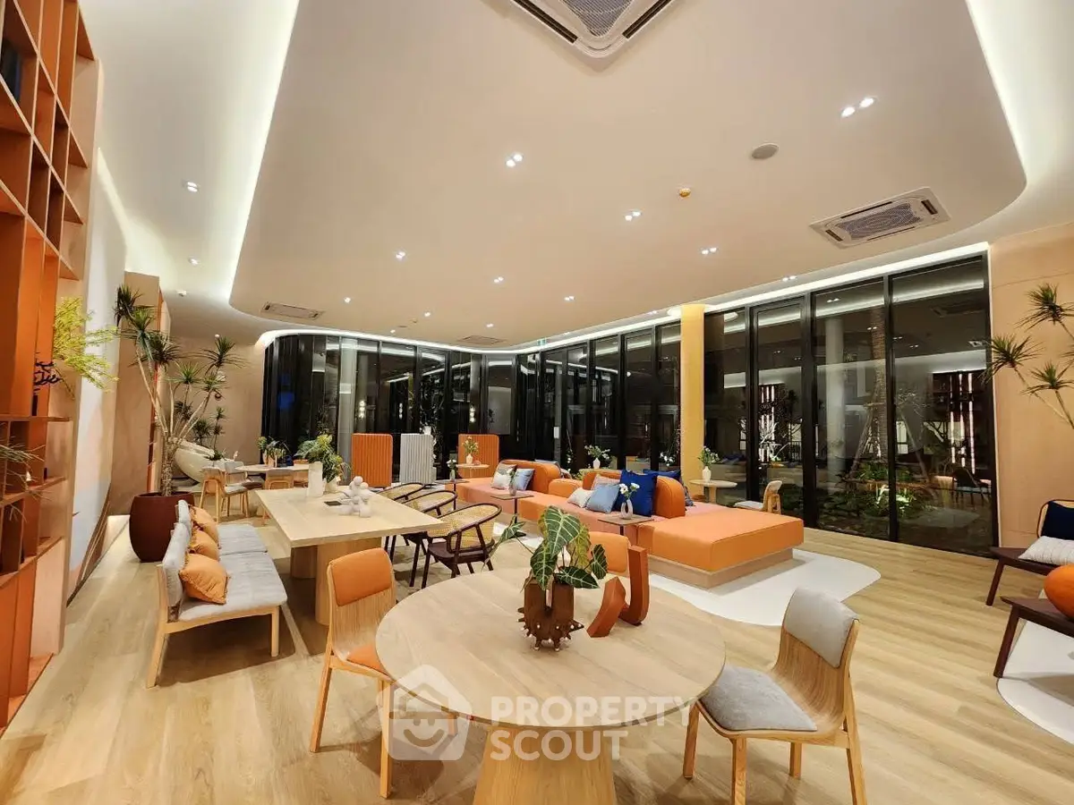 Luxurious modern living room with elegant decor and spacious seating area, perfect for entertaining guests.