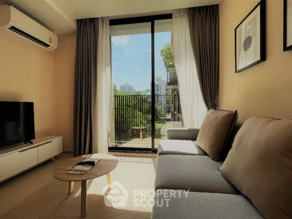 Modern living room with balcony view and stylish decor