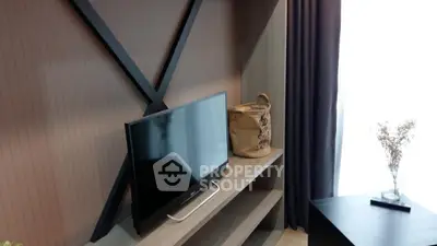 Modern living room with stylish TV setup and elegant decor