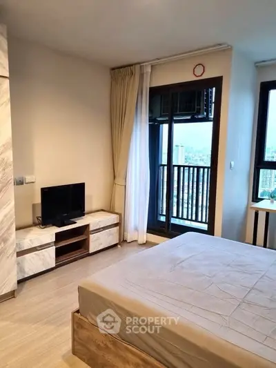 Modern bedroom with city view and stylish decor