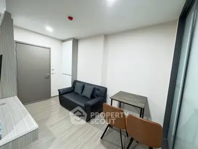 Modern compact living room with sleek furniture and minimalist design