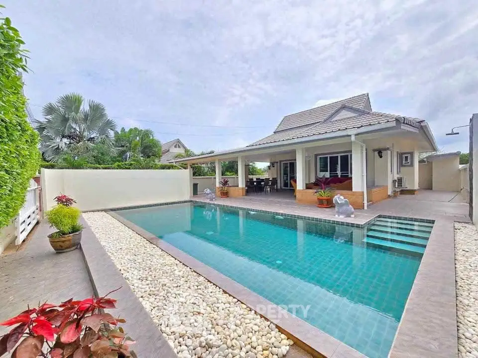 Charming single-story home with private pool and lush garden, perfect for relaxation and entertaining.