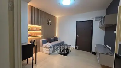 Modern living room with stylish lighting and cozy seating area