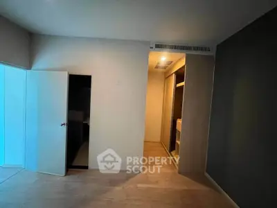 Spacious bedroom with walk-in closet and modern design
