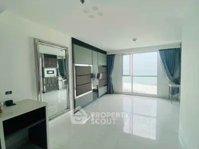 Spacious living room with ocean view and modern decor