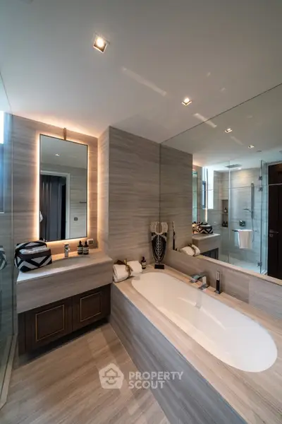 Luxurious modern bathroom with elegant bathtub and stylish lighting