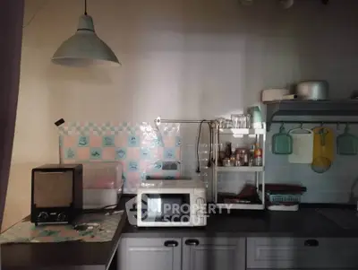 Charming kitchen with vintage appliances and cozy decor