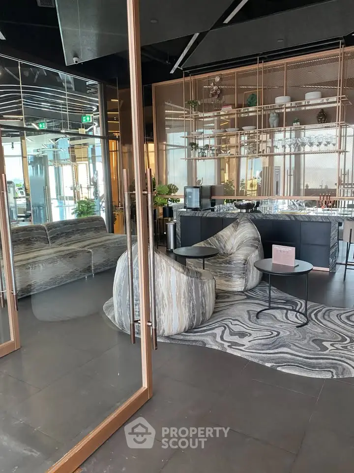 Luxurious modern lounge with stylish seating and elegant decor