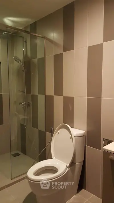 Modern bathroom with sleek shower and stylish tile design