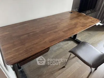 Modern wooden desk with sleek chair in stylish home office setting