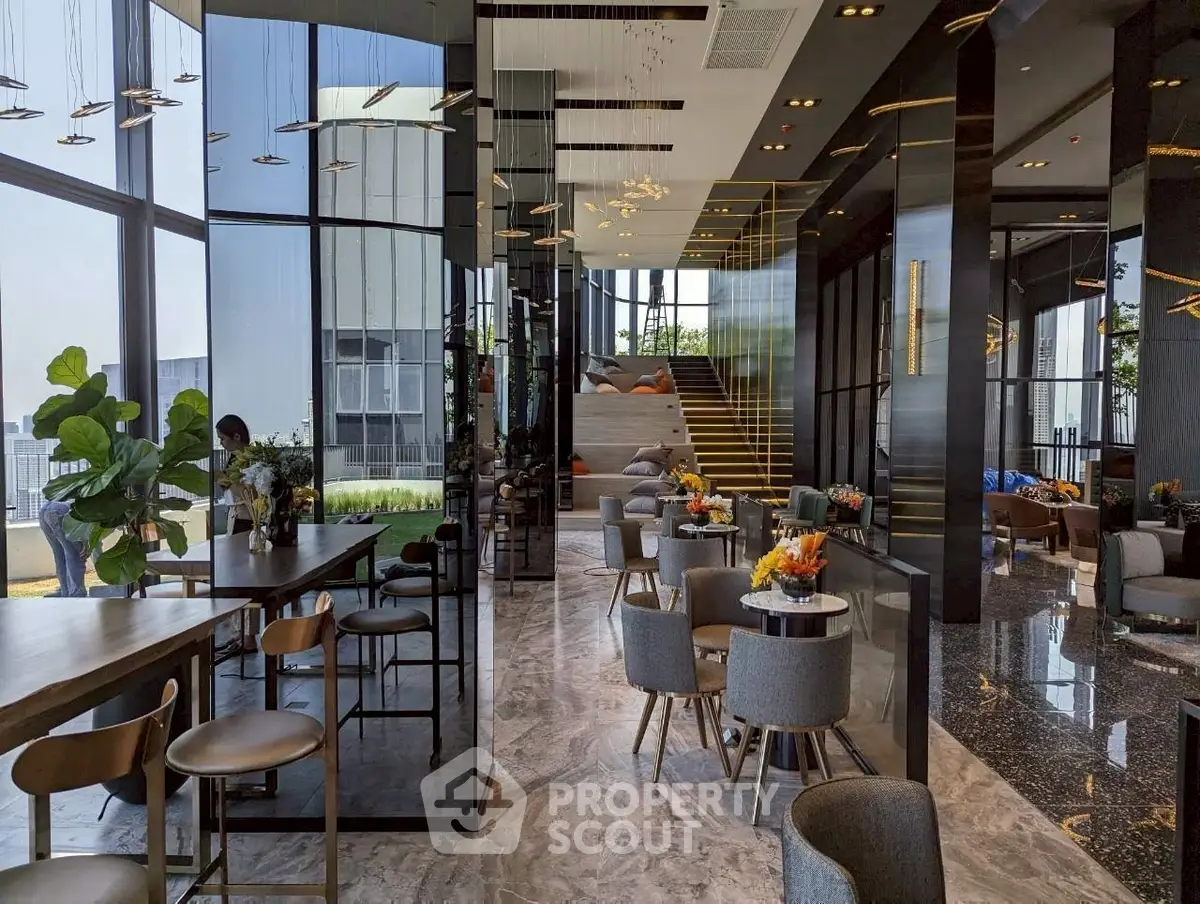 Luxurious modern living room with elegant decor and panoramic city views.