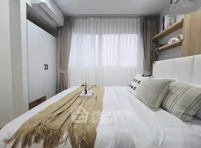 Cozy bedroom with modern decor and natural light