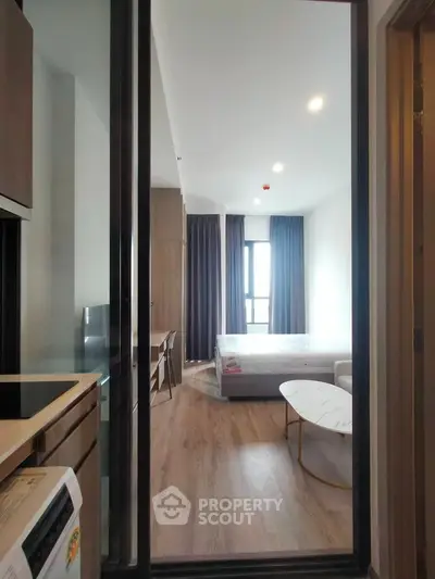 Modern studio apartment with sleek design and natural light