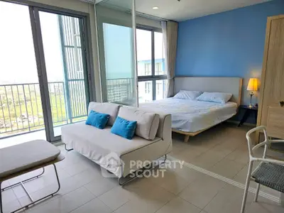 Modern studio apartment with balcony and stylish interior design