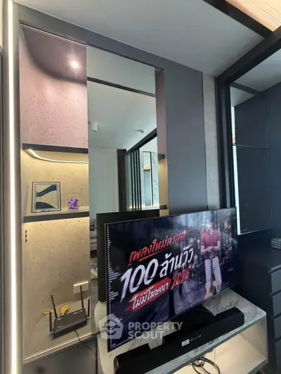 Modern living room with sleek TV setup and stylish decor