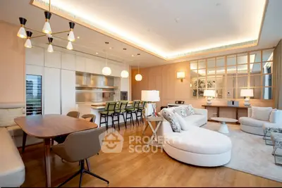 Luxurious open-plan living room with modern kitchen and elegant furnishings