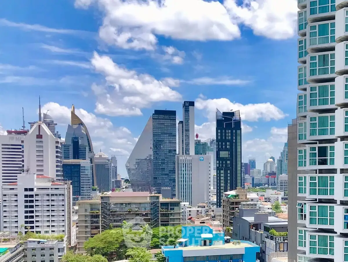 Stunning cityscape view with modern skyscrapers and blue sky, perfect for urban living enthusiasts.