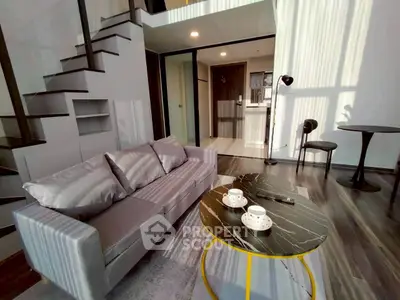 Modern duplex living room with stylish furniture and natural light